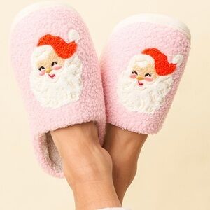 New with tags. Santa slippers. Fits Size 8-10. Super soft and comfy. Hard sole